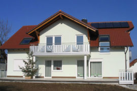 Innen- und Außenputzarbeiten mit Fensterfaschen und Farbgestaltung